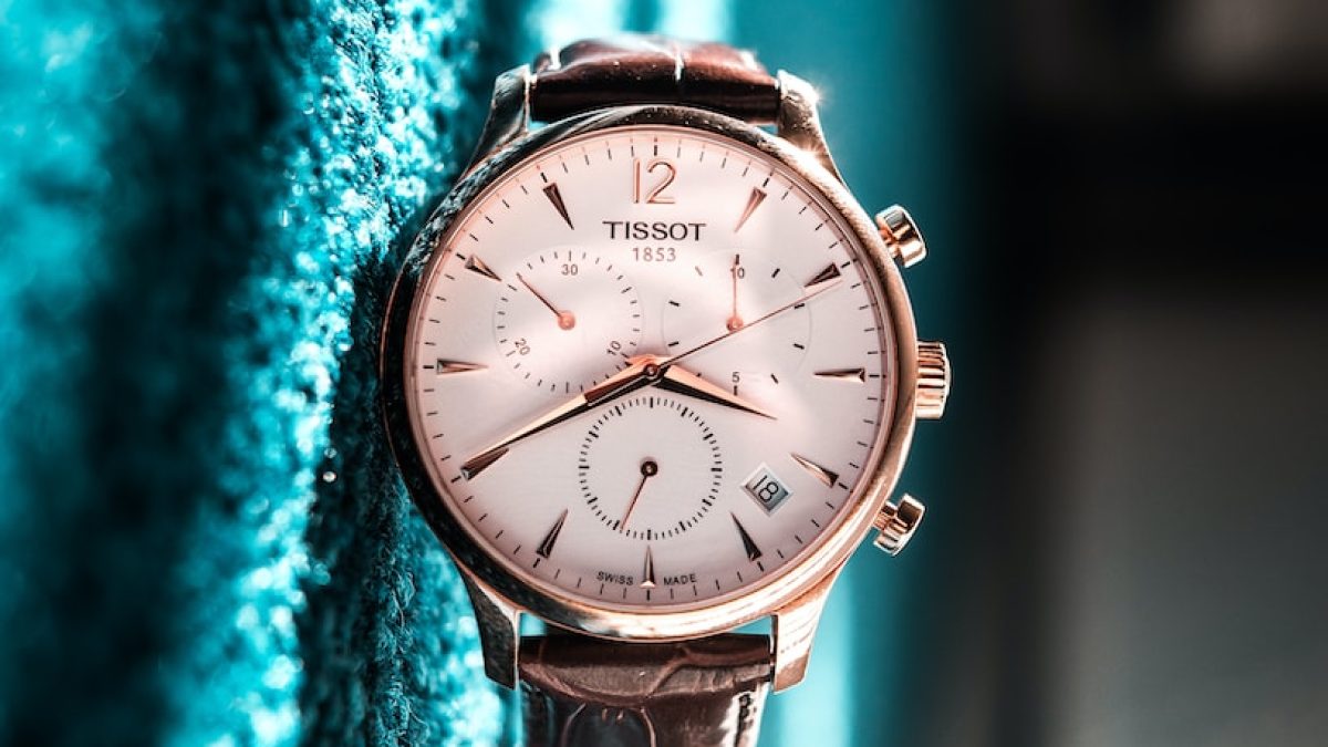 round silver-colored Tissot chronograph watch